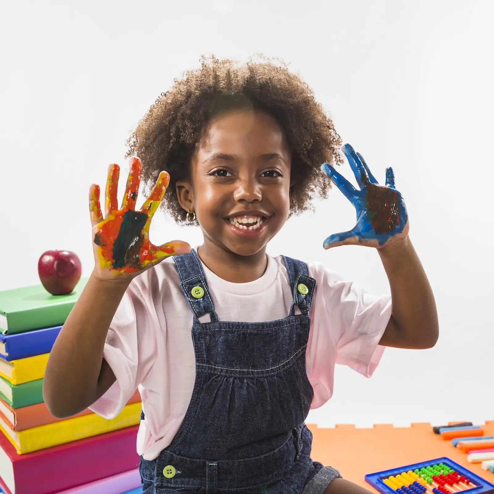 A happy child with painted hands